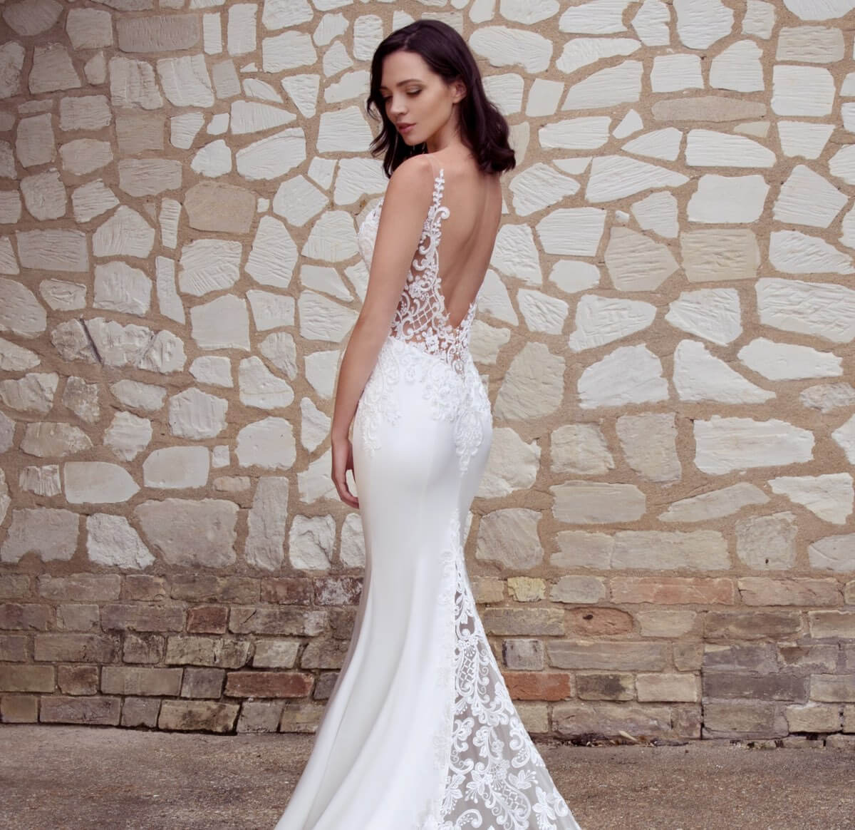 Model Wearing a bridal gown by Dando London