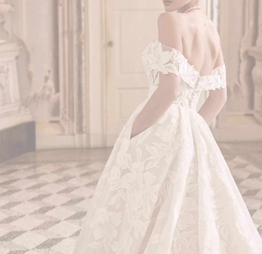 Model Wearing a bridal gown by Justin Alexander