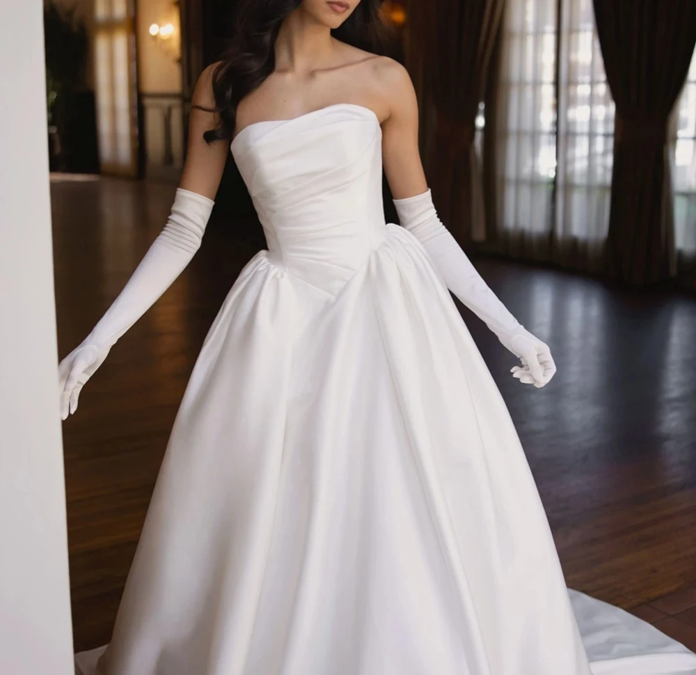 Model Wearing a bridal gown by Essense of Australia